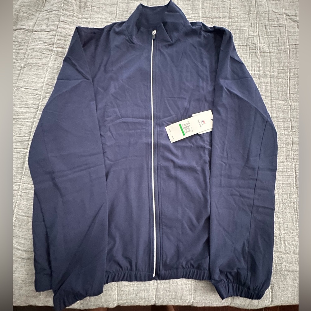 NWT Unworn Fila light jacket from their tennis line. Size Lg. Perfect condition